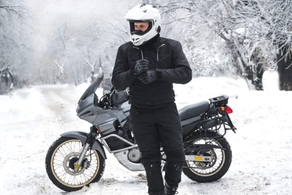 riding a motorcycle in the snow